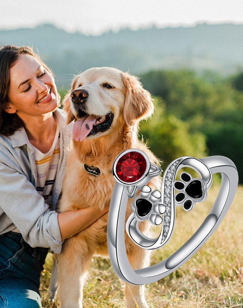 Adjustable Ring with Black Paw Prints & Red Gemstone